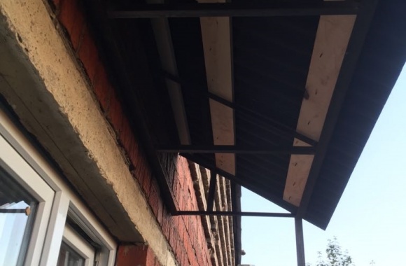 Вынос балкона и монтаж крыши