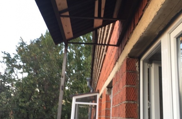 Вынос балкона и монтаж крыши